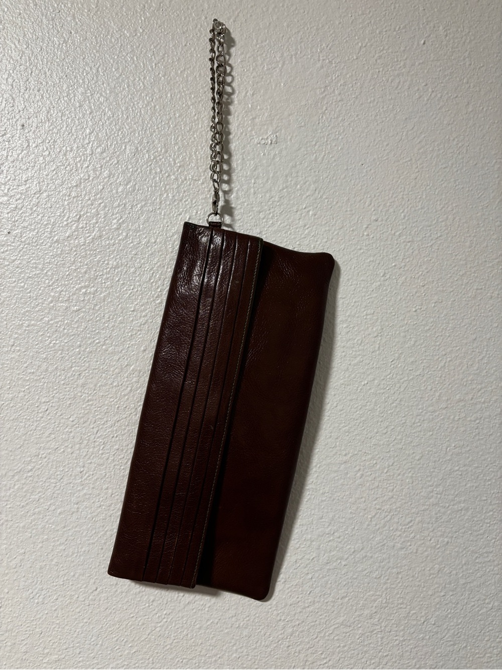 Tusk brown pleated leather fold over clutch with silver chain